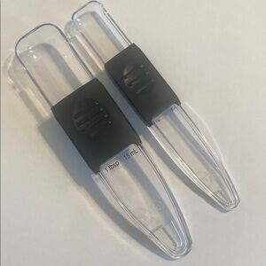 The Pampered Chef Clear and Black adjustable Measuring Spoons